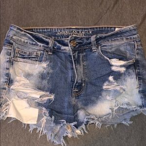 Distressed medium wash jean shorts